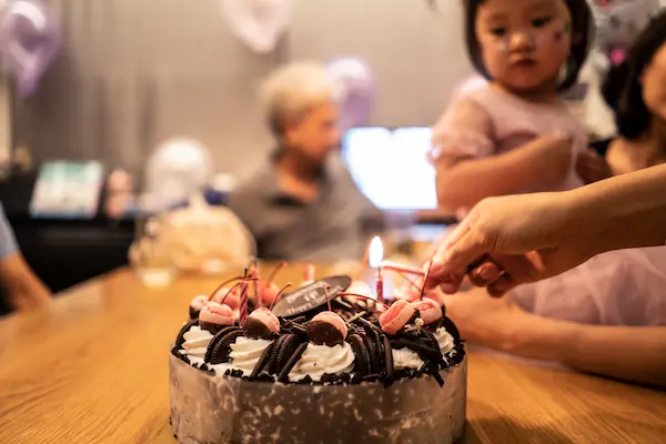 Adults enjoying premium bowling lanes and cocktails